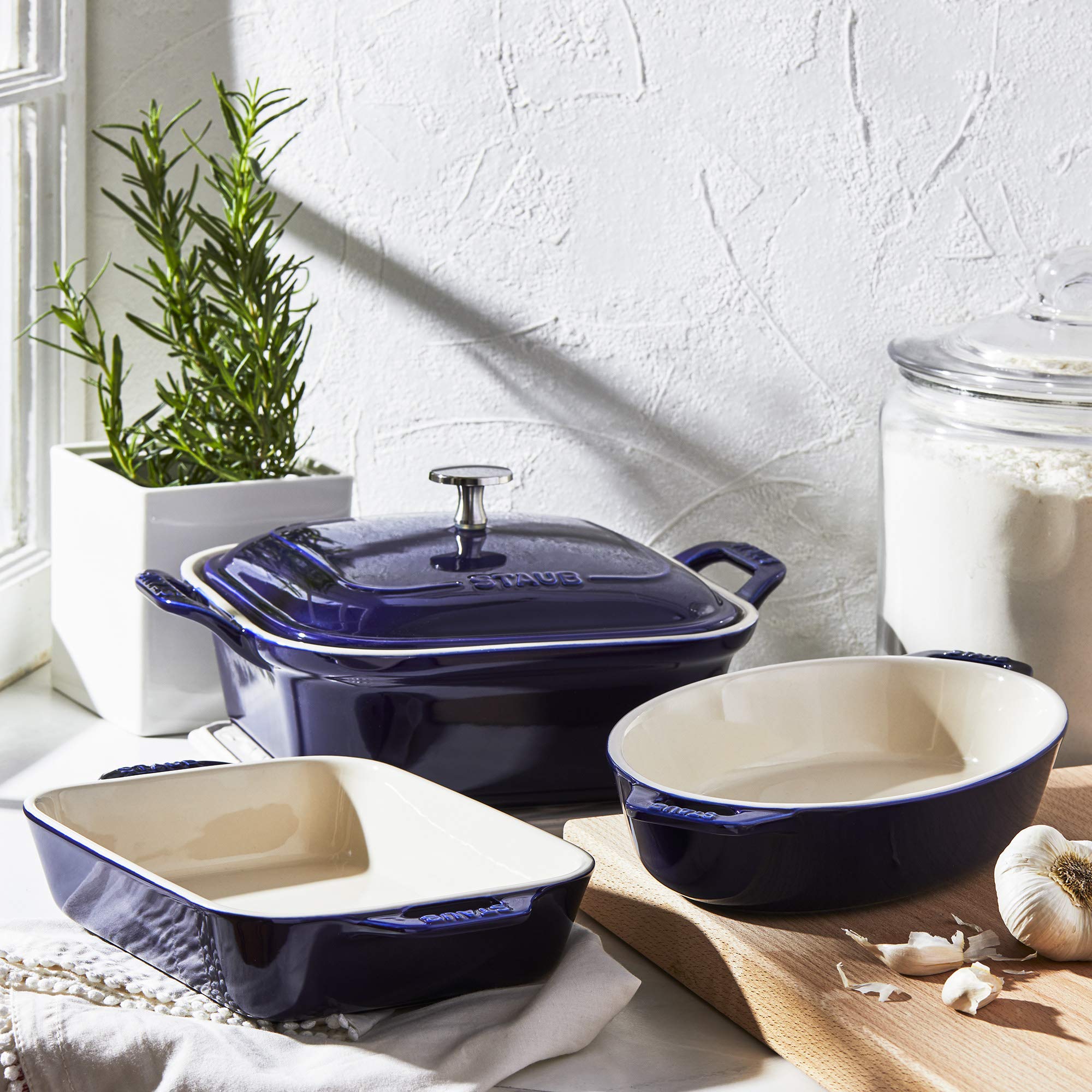Staub enamel glaze finish on ceramic ware adds color and easy cleaning.