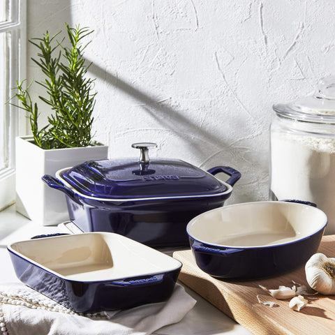 Staub enamel glaze finish on ceramic ware adds color and easy cleaning.
