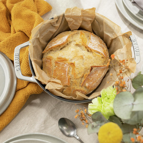 Staub cocotte bottom demonstrates induction compatibility for versatile cooking