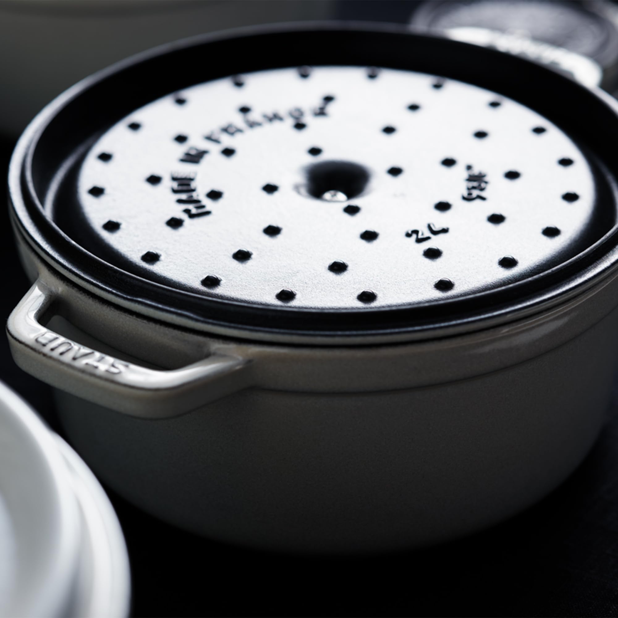 Staub lid spikes visible deliver rain-forest moisture return for juicy results