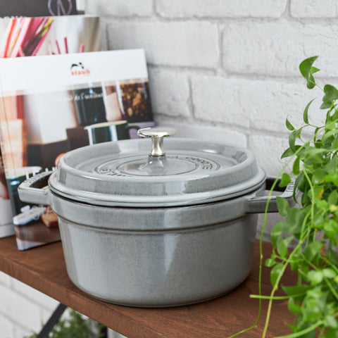 Staub brass knob withstands heat up to 500F for safe handling