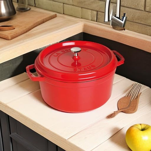 Staub enamel bottom works on induction for versatile cooking.