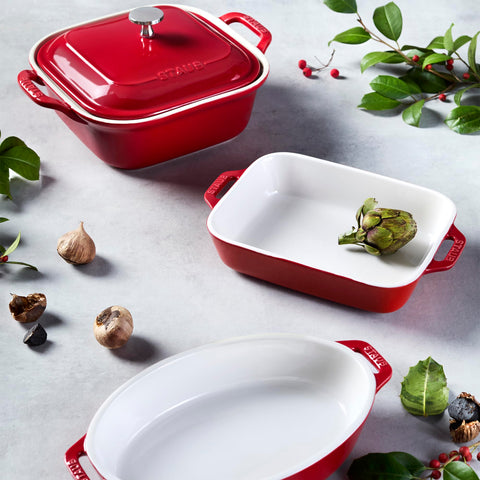 Staub high-heat safe up to 572F without lid.