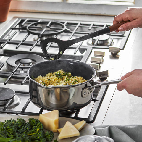 STAUB Risotto Spoon hole design prevents clumps when serving risotto.