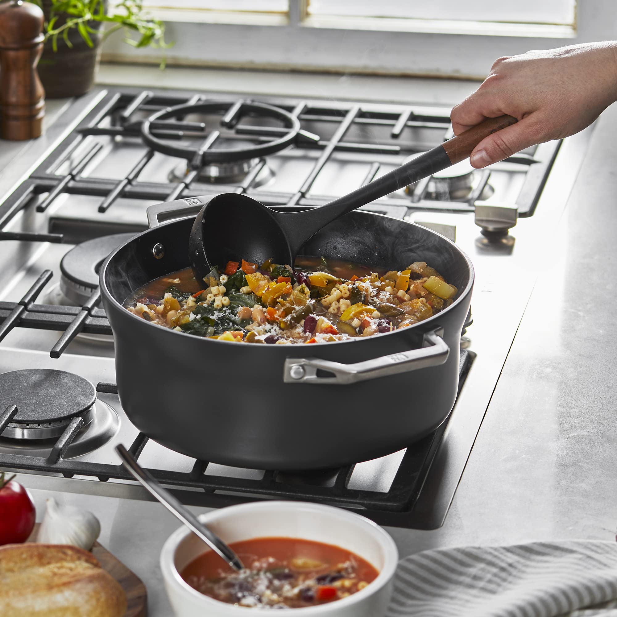 STAUB soup ladle features an Acacia wood handle for comfortable grip.