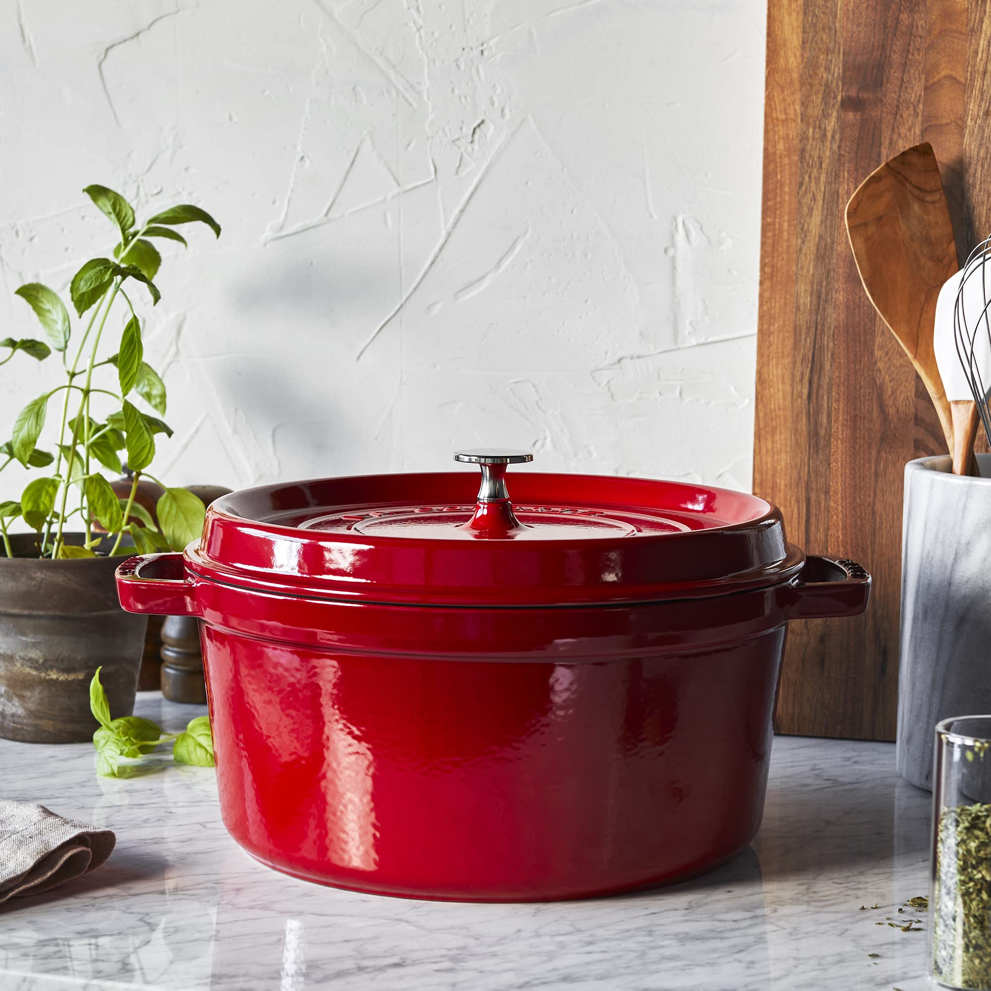 Staub table-ready cherry enamel finish complements home meals.