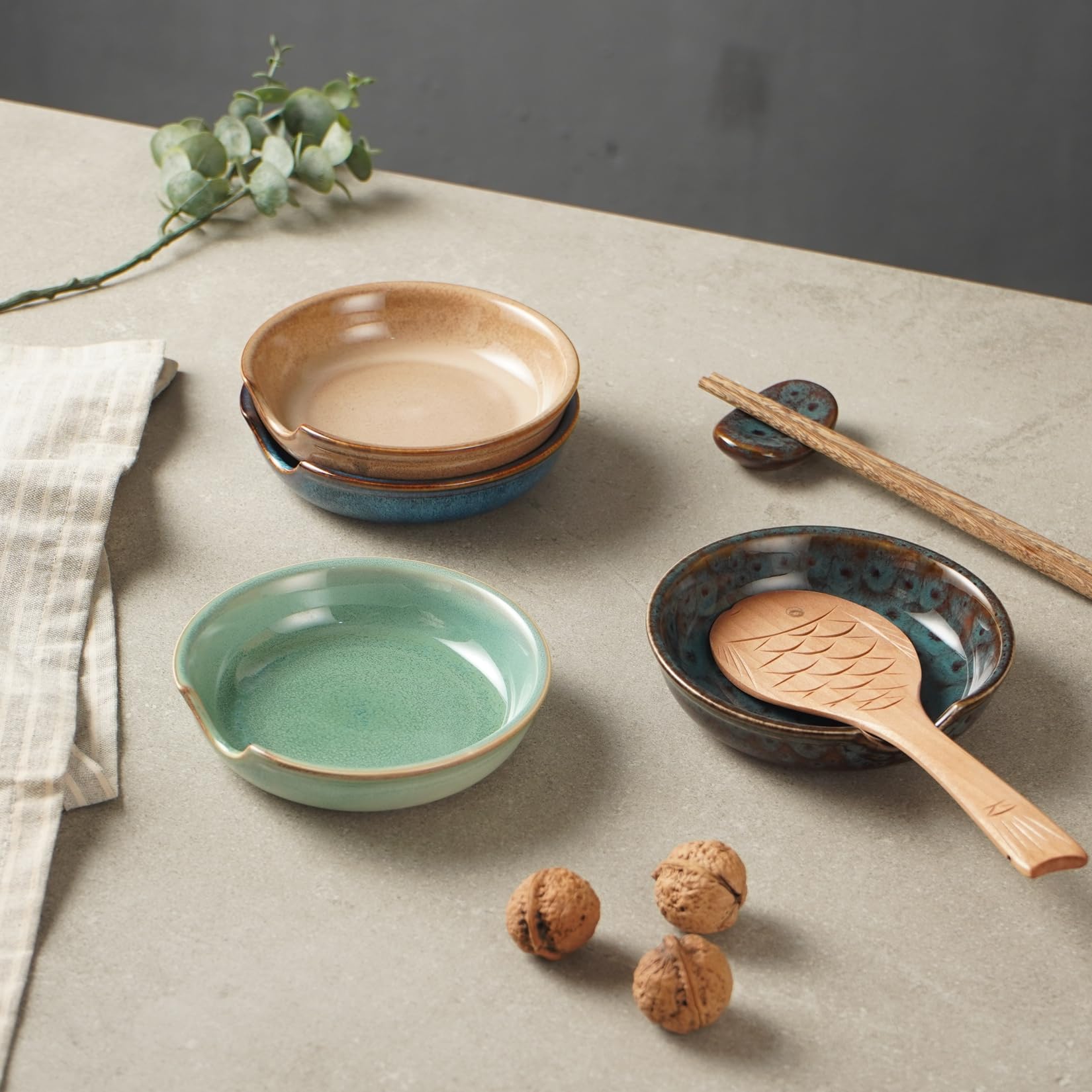 STE-CER spoon rest on countertop with reactive glaze for farmhouse style.