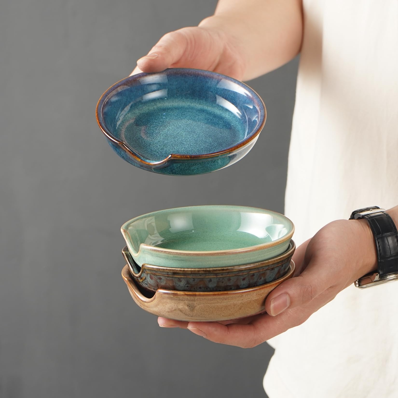 STE-CER set of four spoon rests showcased as a coordinated kitchen accessory.