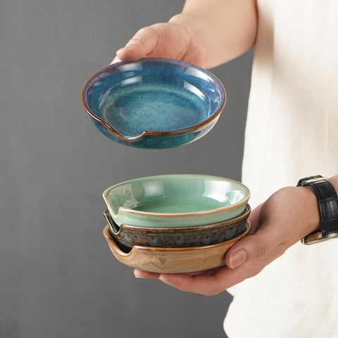 STE-CER set of four spoon rests showcased as a coordinated kitchen accessory.