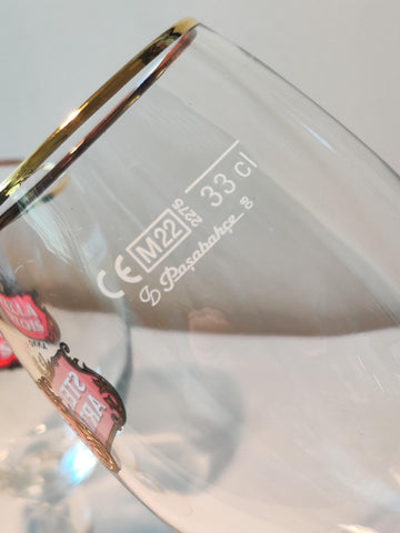 Stella Artois original glass chalice logo detail enhances branding during service.