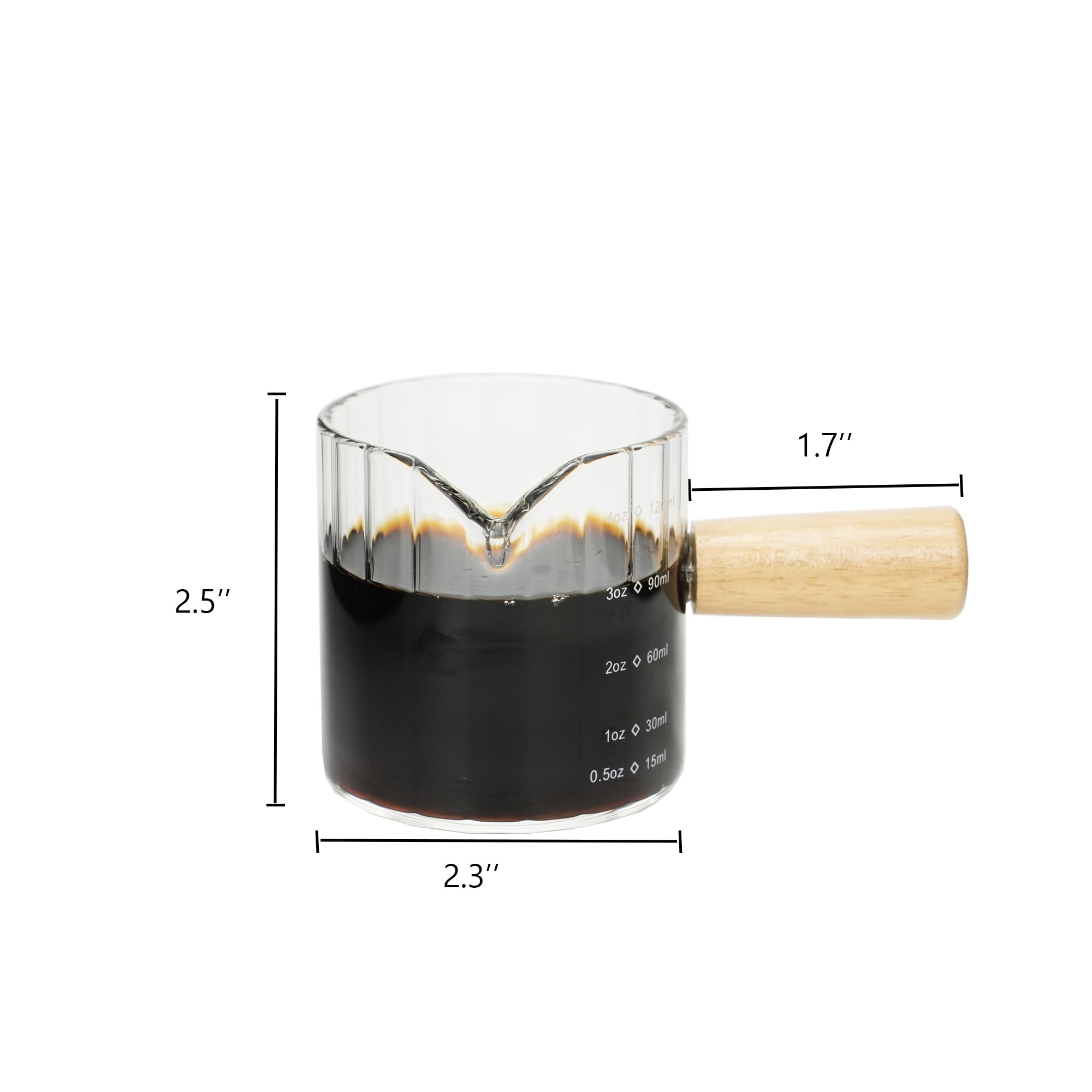 Steviieden ribbed glass milk frothing pitcher adds texture and control.