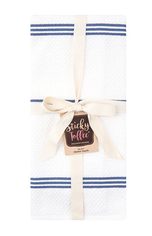 Sticky Toffee dish towels in action, drying dishes and wiping spills.