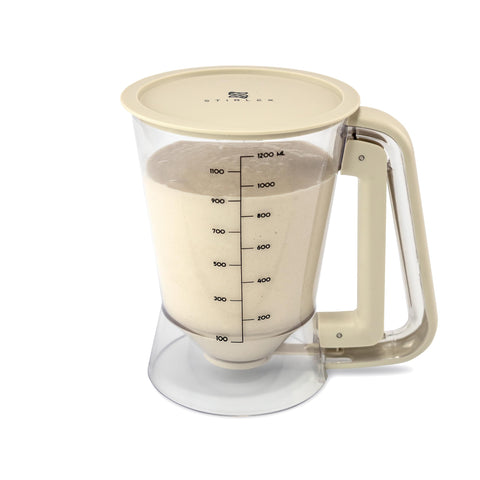 STIRLEX dispenser shows both cups and milliliters for versatile batter portions.