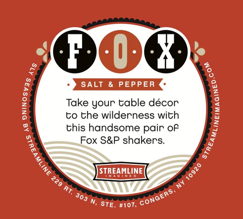 Streamline Imagined Fox salt and pepper shakers resting on a dining table.