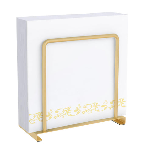 STWWO gold napkin holder on table keeps napkins neat and accessible.
