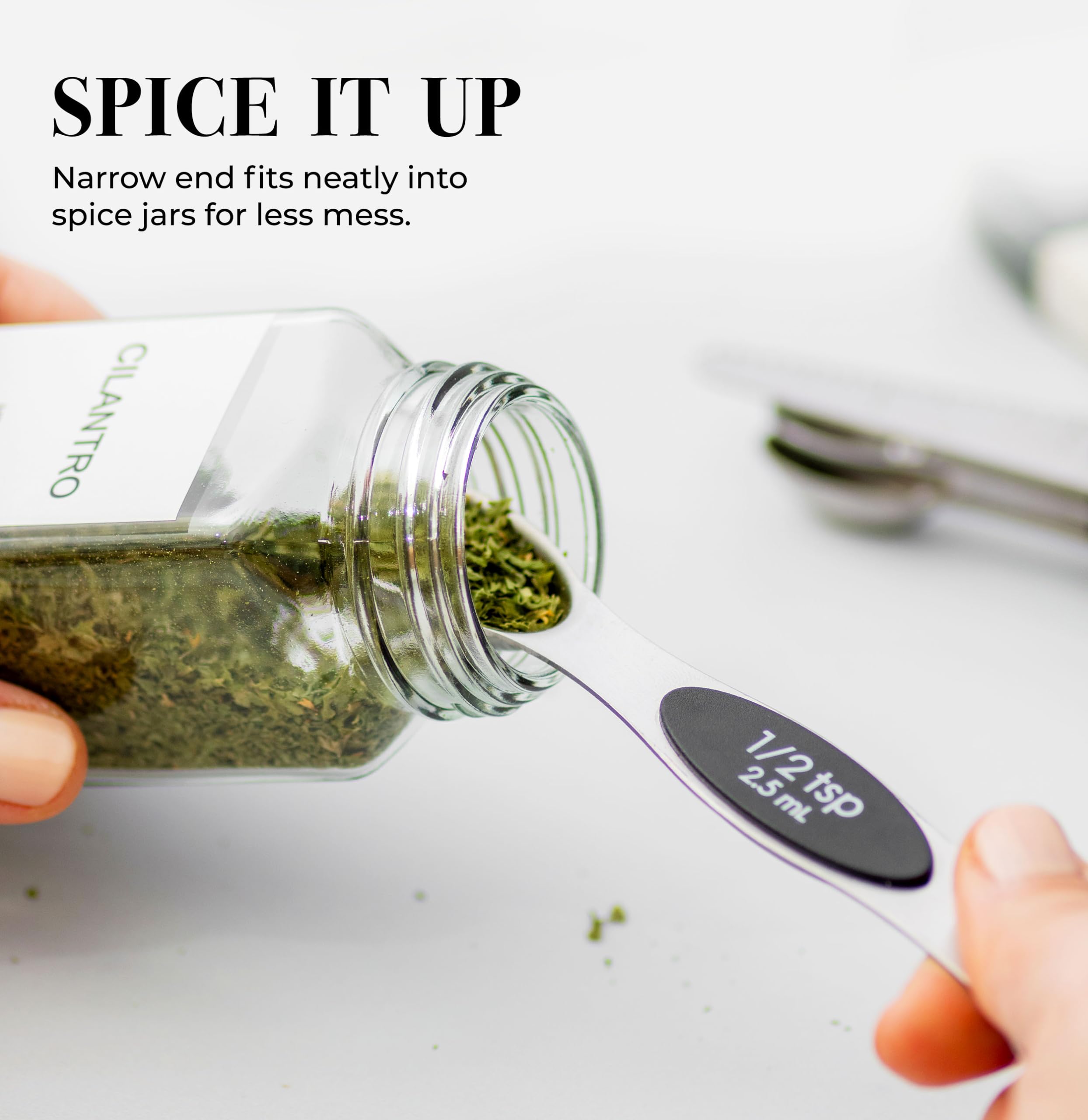STYLED SETTINGS Stanless Steel spoons shown as dishwasher-safe for easy cleanup.