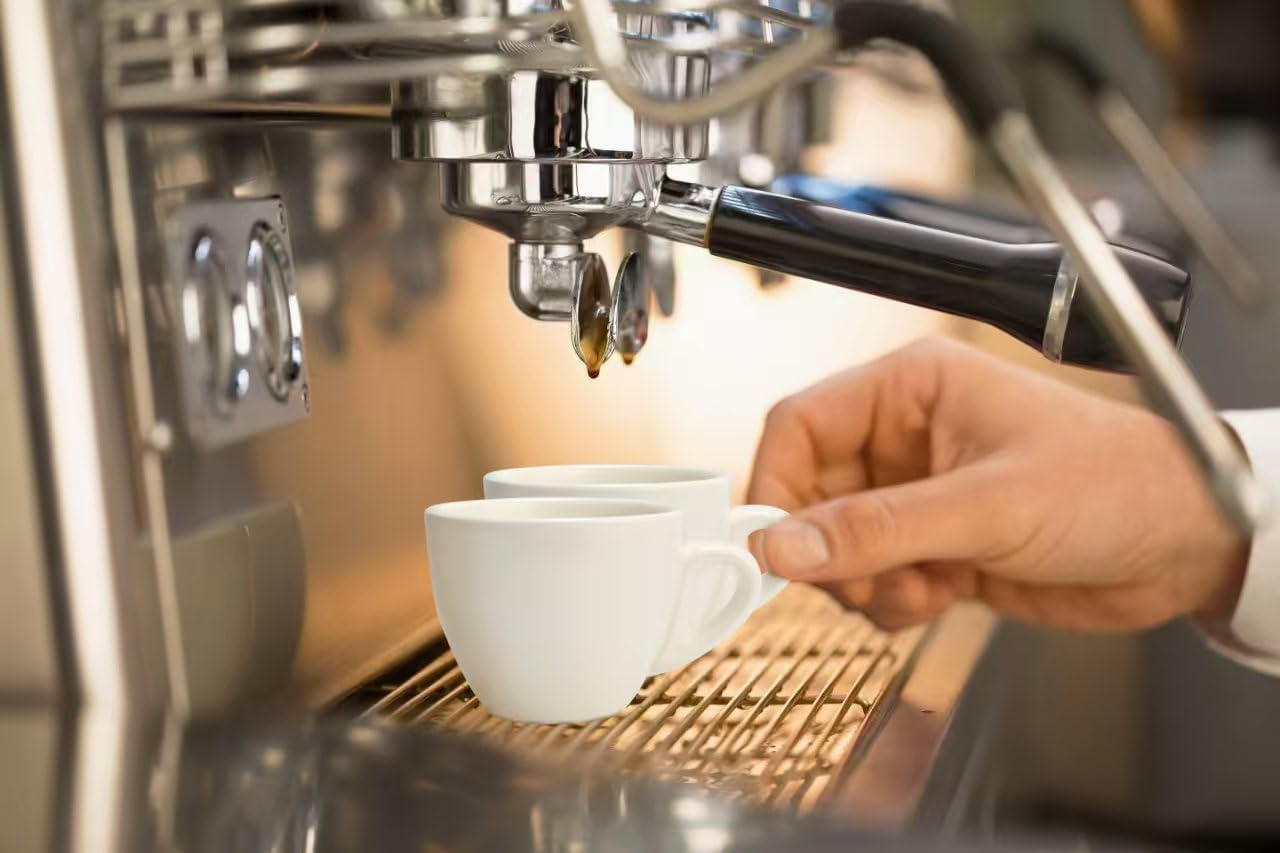 Stylusella pure white espresso cups on a dining table ready for serving