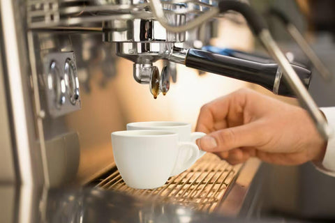 Stylusella pure white espresso cups on a dining table ready for serving