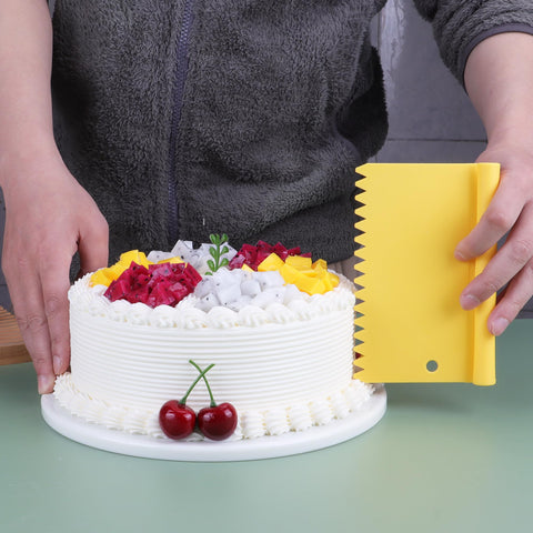 Suanyok cake scraper with handle for smooth icing and shaping.