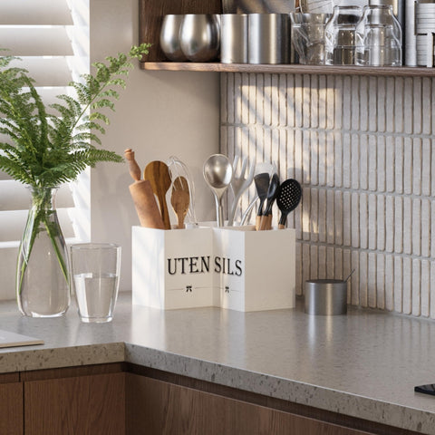 Suli farmhouse decor utensil holder adds warm texture to cooking space.