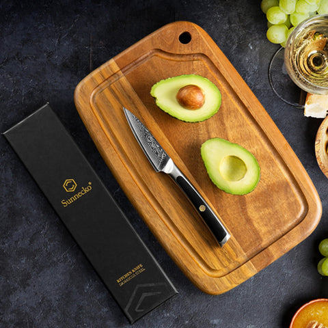 Sunnecko paring knife Damascus blade pattern close-up emphasizes durability.