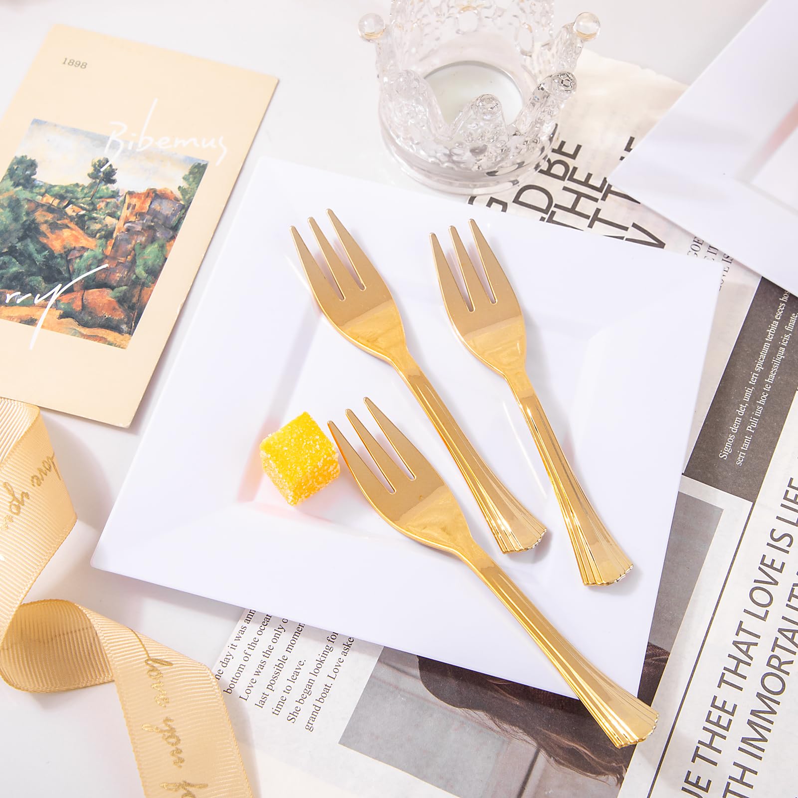 Close-up of Supernal gold-accent dinnerware with dessert plates