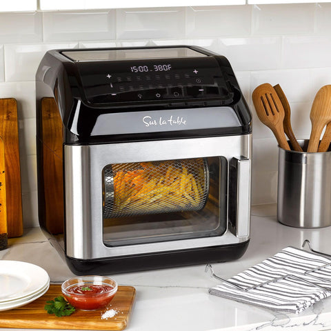 Sur La Table left hinge air fryer angled touchscreen highlights 16 presets for versatile cooking