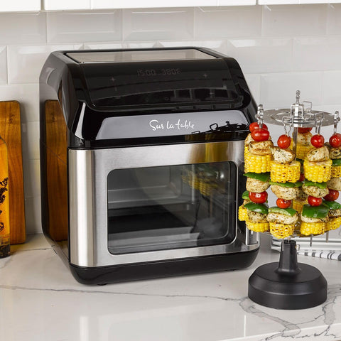 Sur La Table left hinge air fryer with door open shows roomy 13-quart capacity