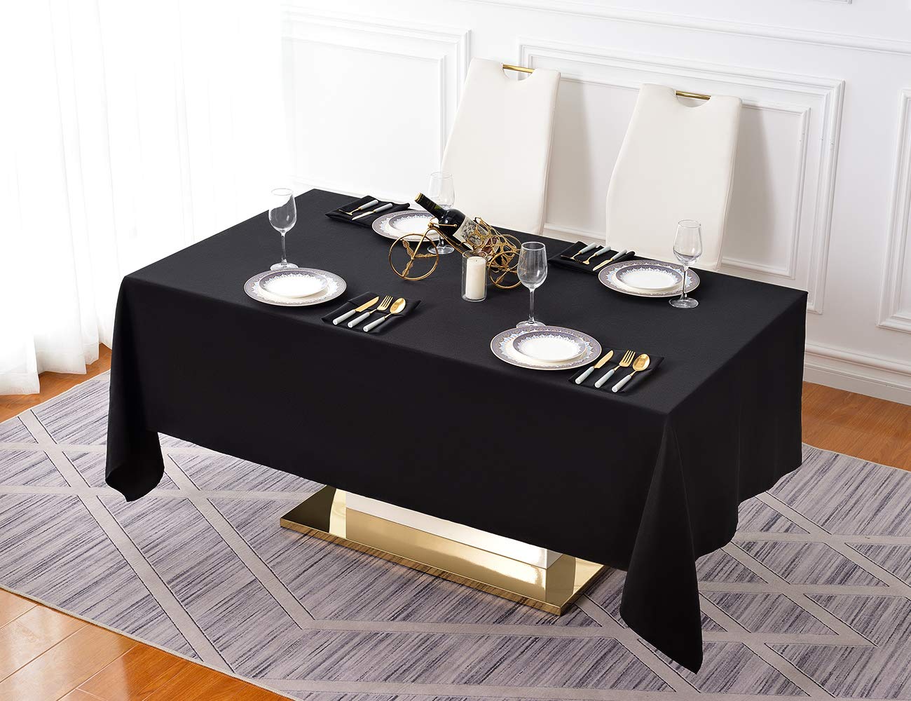 Surmente edge-drape black tablecloth 60x102 adds subtle elegance to tables.