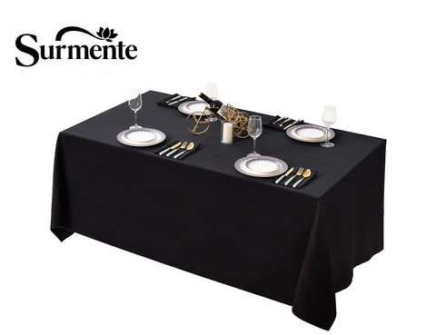 Surmente tablecloth setup for wedding banquet showcasing full edge drape.