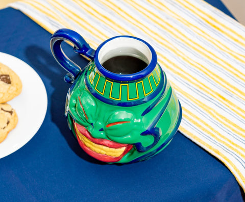 Surreal Entertainment Pot of Greed mug suitable for coffee or tea moments