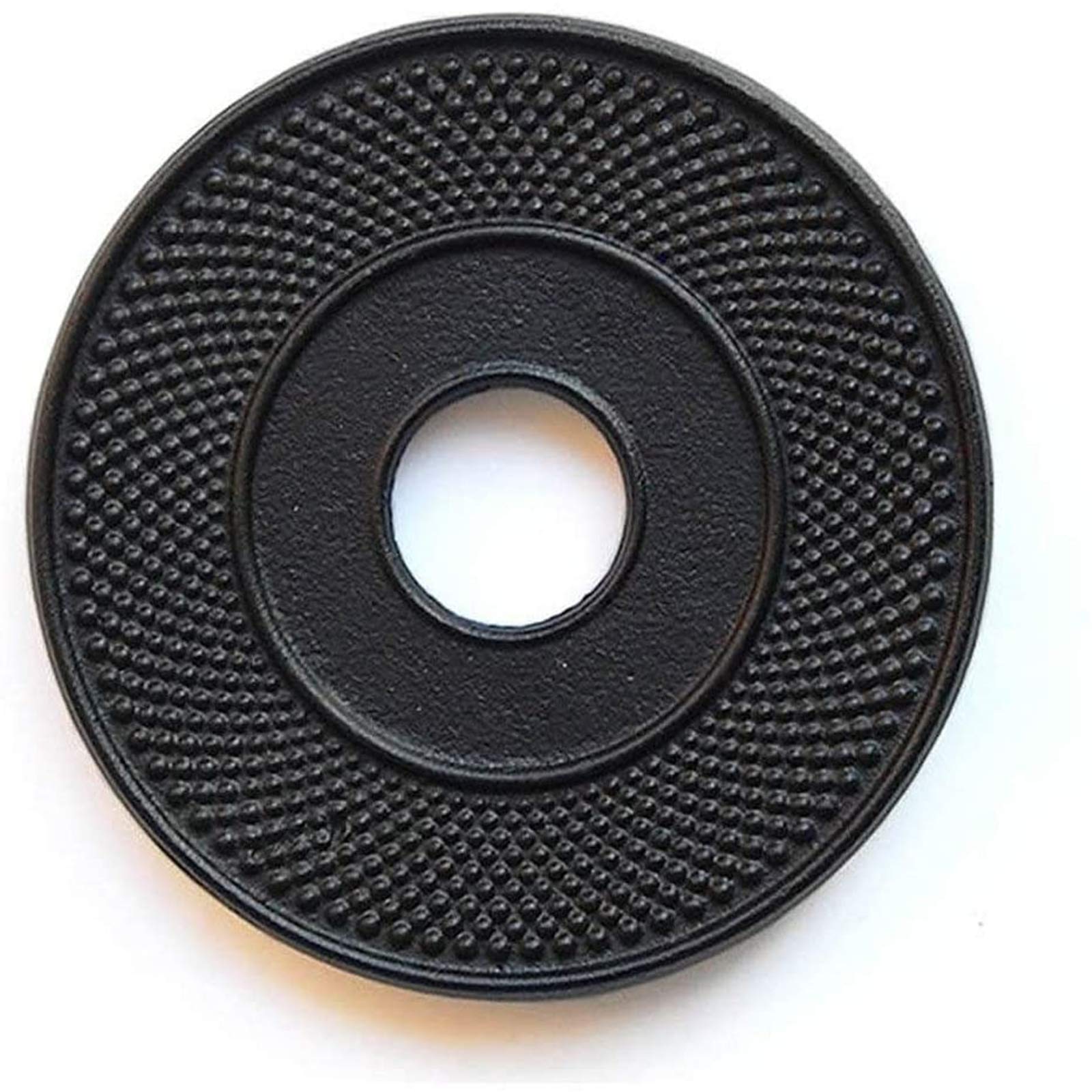 Suyika cast iron mat with rubber pegs supports hot teapots and protects surfaces.