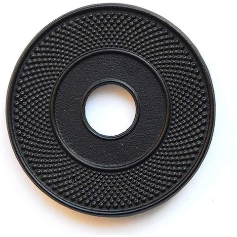 Suyika cast iron mat with rubber pegs supports hot teapots and protects surfaces.
