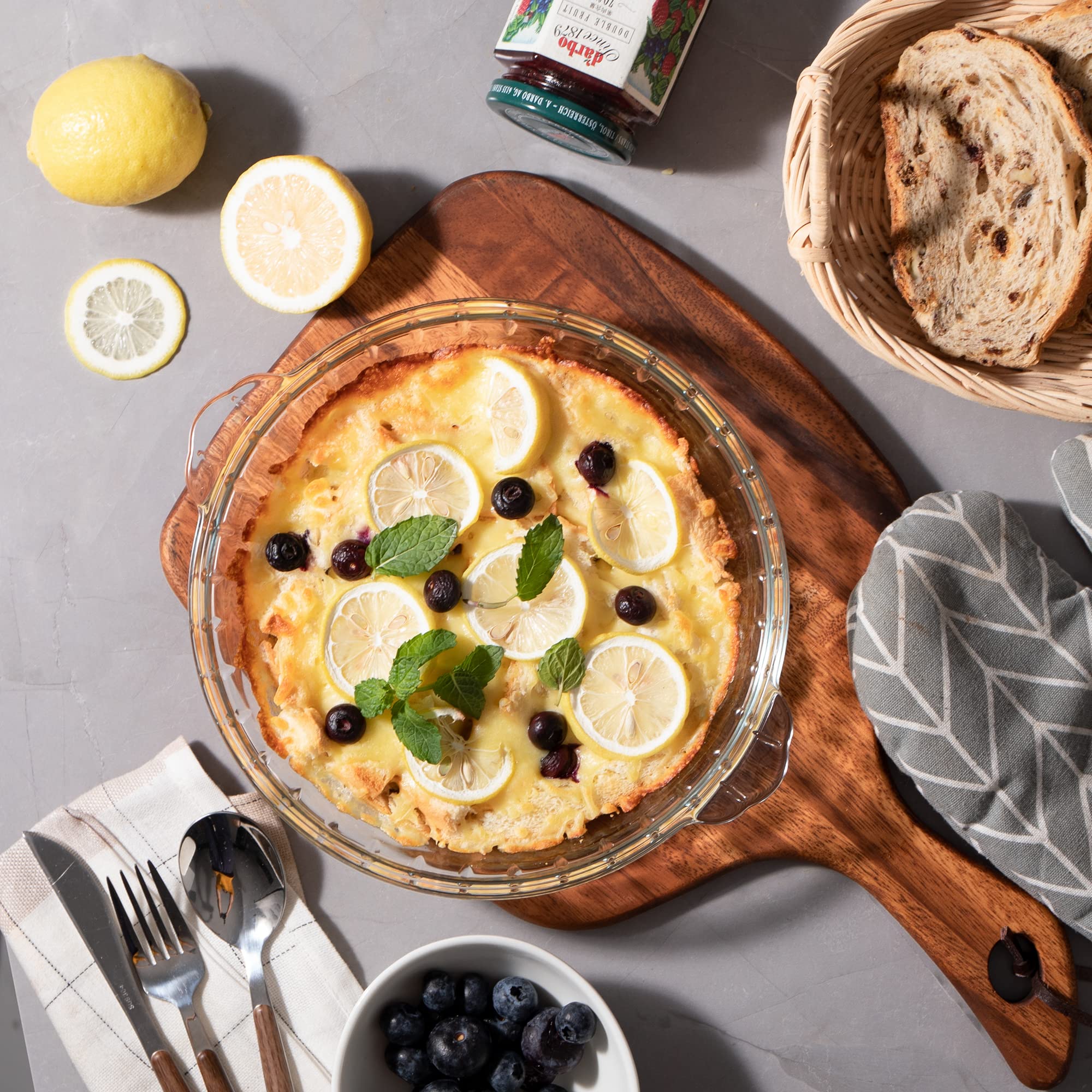 Sweejar 2-pack glass pie pan in the oven showcases heat-ready bakeware for pies and quiches.