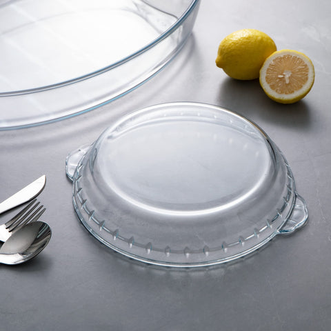 Sweejar glass pie pan on table ready to serve pies or vegetables.