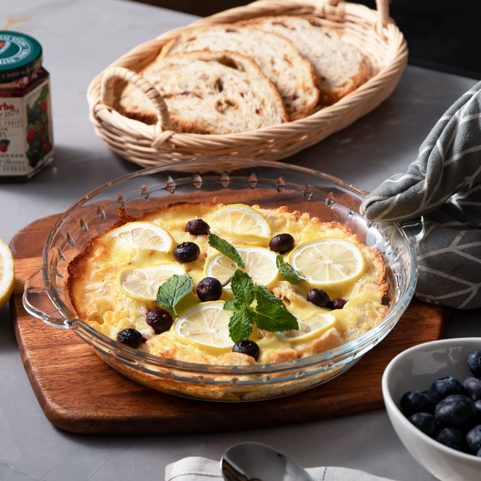 Sweejar glass pie pan with side handles for safe transfer from fridge to oven.