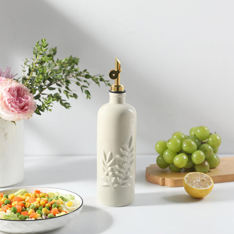 Sweejar eighteen-oz olive oil dispenser on kitchen counter