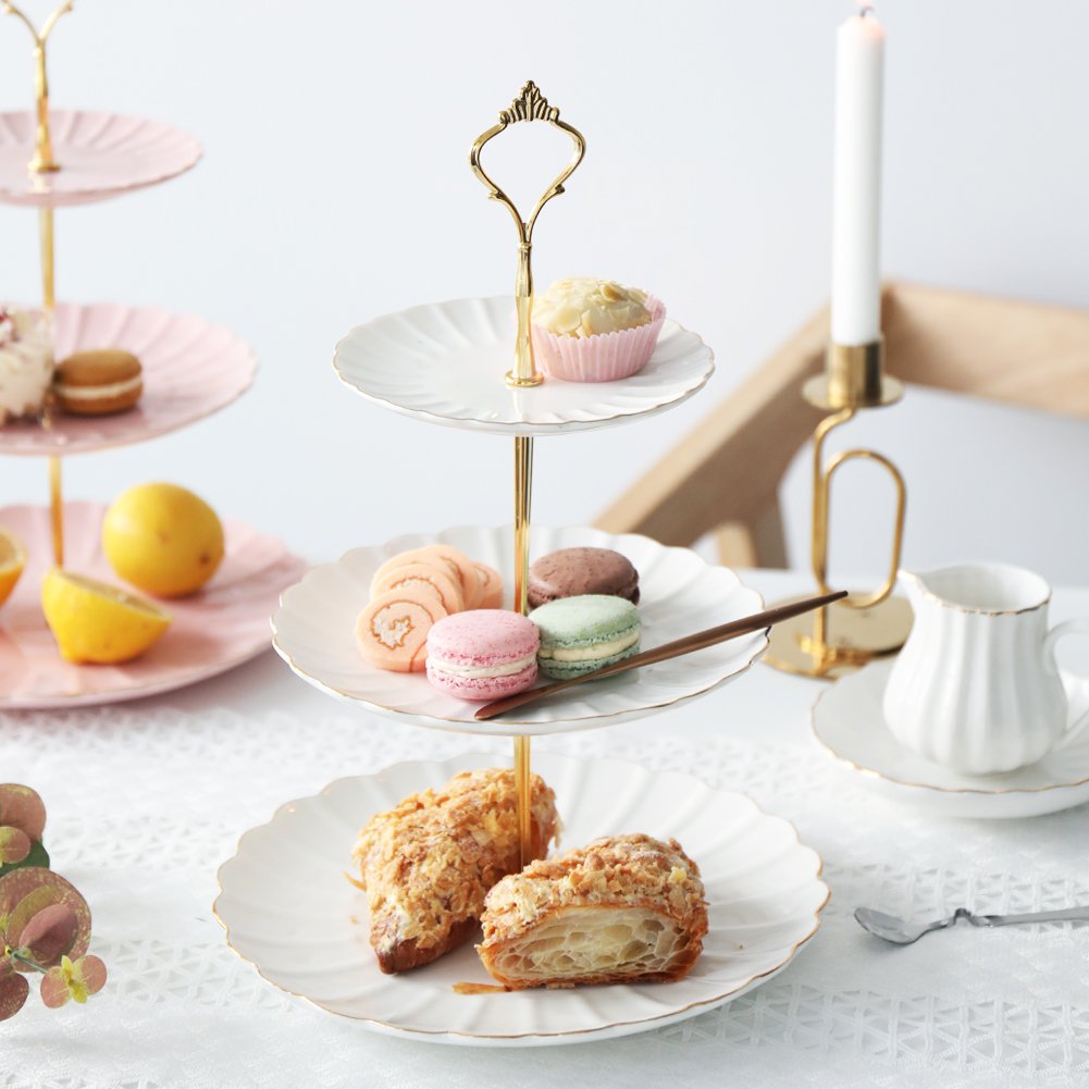Sweejar cake stand with gold trim highlights desserts.