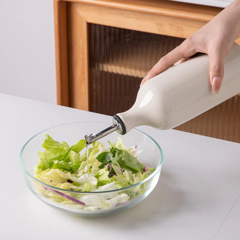 Sweejar pour spout provides precise, drip-free pouring for oils and sauces.