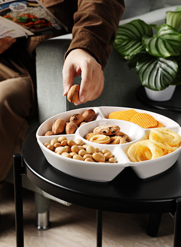 Sweese serving set displayed on a party table with assorted snacks