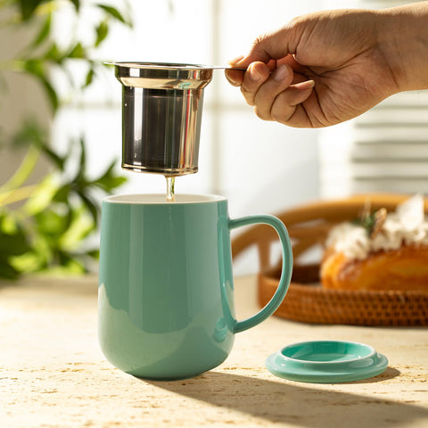 Sweese porcelain mug with ergonomic cool handle for comfortable sipping.