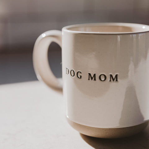 Sweet Water Decor Dog Mom mug in a kitchen, versatile for hot or cold drinks.