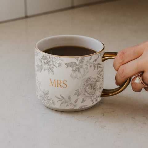 Close-up of the gold handle adds a luxe touch to daily coffee.