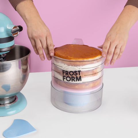 Sweetshop Frost Form Starter Kit stand holding a decorating cake securely.