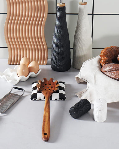 Swicken checkered spoon rest, microwave safe and stain resistant.