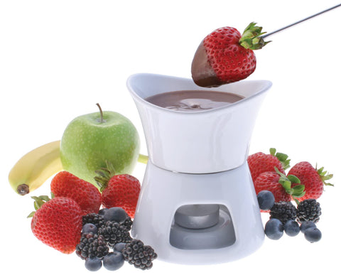 Swissmar Glow tea light candle provides gentle heat.