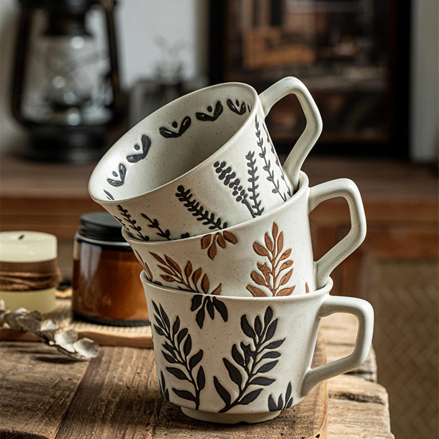 Two-mug botanical set shown on a farmhouse table.