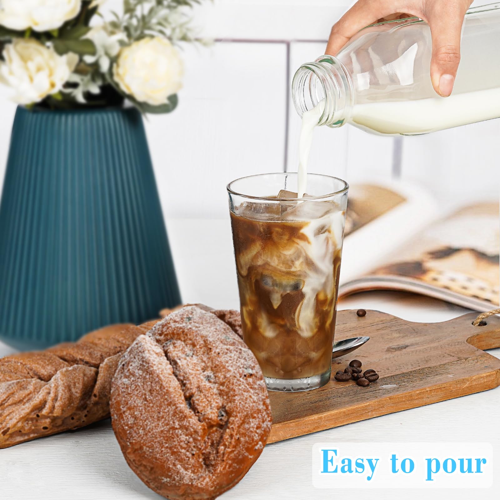 Syntic Liter glass bottle supports versatile uses like milk and jams.