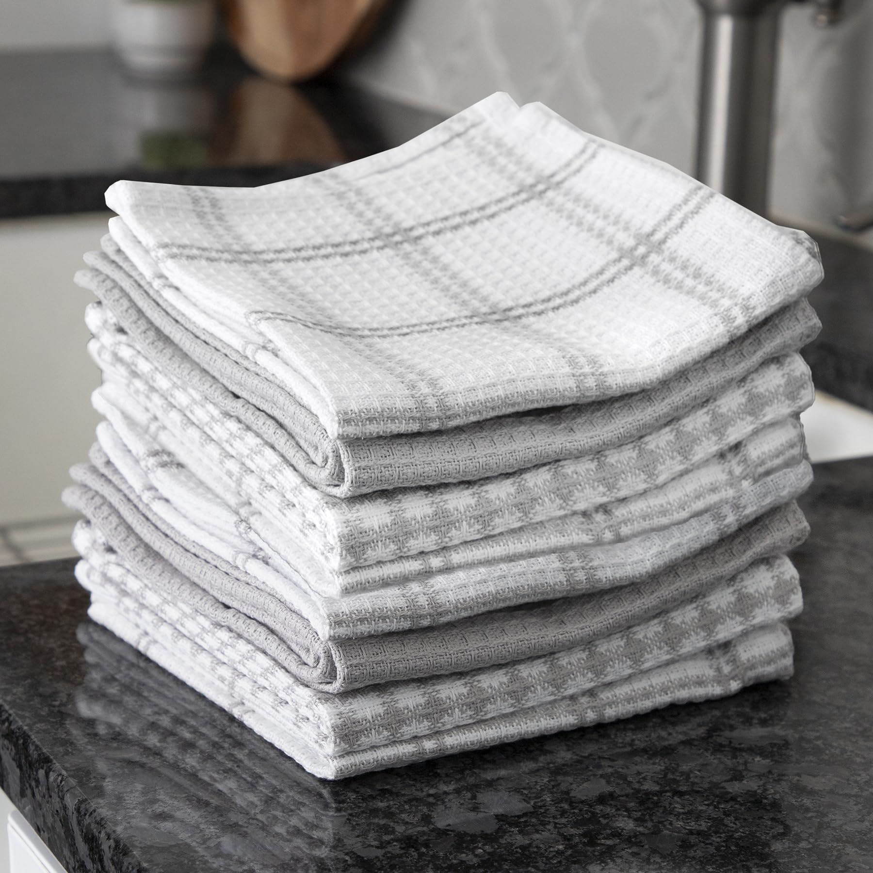 Absorbent cotton cloth dries dishes fast with waffle-weave air flow.