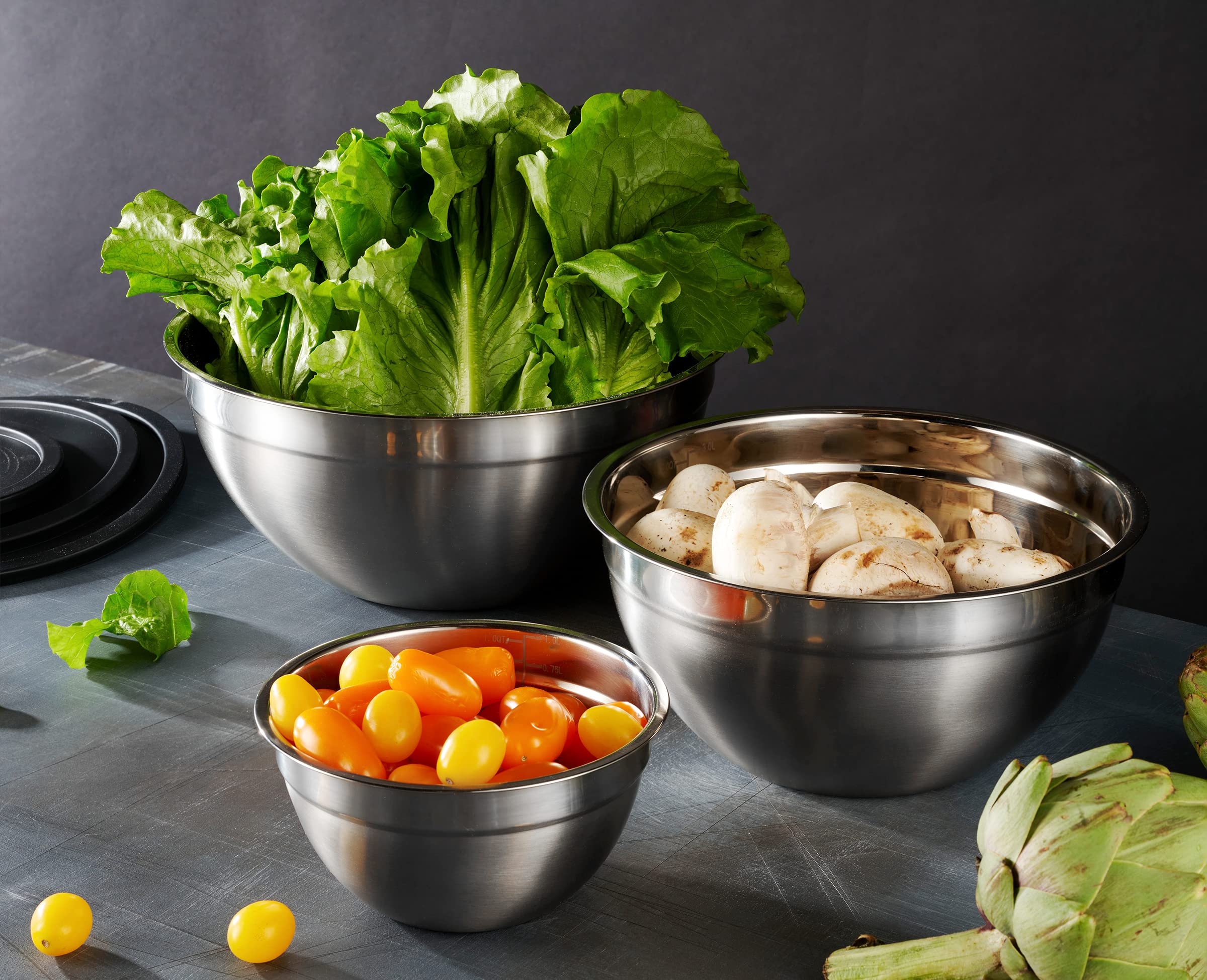 Table Concept stainless steel bowls nest together for space-saving storage.